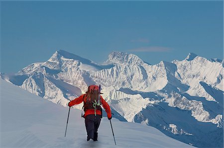 Rear view of climber moving up through deep snow, Swiss Alps, Canton Wallis, Switzerland Foto de stock - Sin royalties Premium, Código: 649-08328453