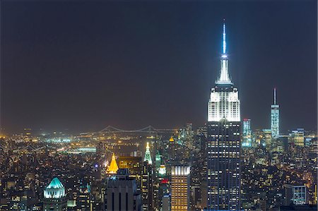 High angle cityscape of midtown Manhattan and Empire State building at night, New York, USA Stock Photo - Premium Royalty-Free, Code: 649-08328568