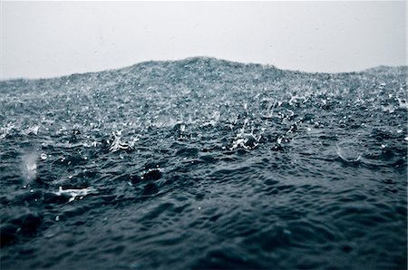 surface - Heavy raindrops hitting surface of ocean, Cocos Island, Costa Rica Stock Photo - Premium Royalty-Free, Code: 649-08328798