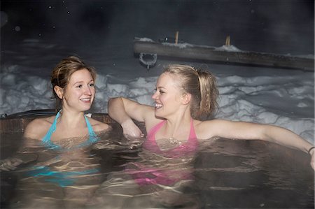 pictures of people in snow in bathing suit - Young women enjoying hot tub Stock Photo - Premium Royalty-Free, Code: 649-08328802