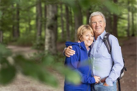 Portrait of couple standing in forest Stock Photo - Premium Royalty-Free, Code: 649-08381575