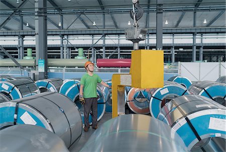 Worker in solar panel assembly factory, Solar Valley, Dezhou, China Photographie de stock - Premium Libres de Droits, Code: 649-08381601