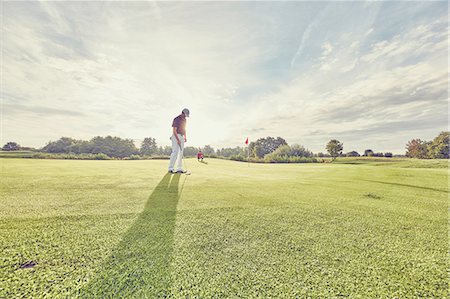 simsearch:649-08422474,k - Golfer on course, Korschenbroich, Dusseldorf, Germany Stock Photo - Premium Royalty-Free, Code: 649-08422475