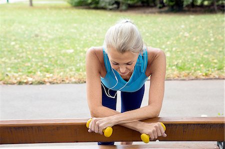simsearch:649-07905288,k - Mature woman taking a break at park bench whilst training in park Stock Photo - Premium Royalty-Free, Code: 649-08422571