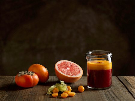 Orange raw juice in a jar with fruits Stock Photo - Premium Royalty-Free, Code: 649-08422906