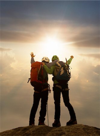 Climbers exulting on mountain top at sunset, Mont Blanc, France Stock Photo - Premium Royalty-Free, Code: 649-08423145