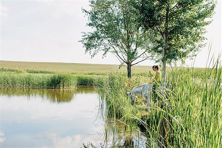 simsearch:649-08900813,k - Woman riding grey horse drinking at lake Stock Photo - Premium Royalty-Free, Code: 649-08423430