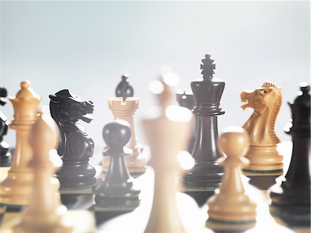 Selective focus close up of chess game and chess pieces Stock Photo - Premium Royalty-Free, Code: 649-08479742