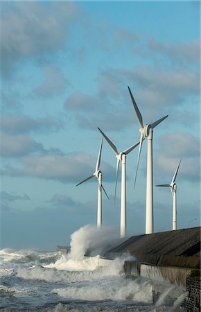 Stormy ocean waves splashing wind turbines and harbour wall, Boulogne-sur-Mer, Pas de Calais, France Stock Photo - Premium Royalty-Free, Code: 649-08479844