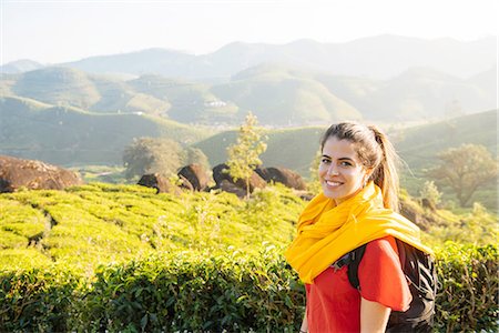 solo picture - Portrait of young woman in tea plantations near Munnar, Kerala, India Stock Photo - Premium Royalty-Free, Code: 649-08480037