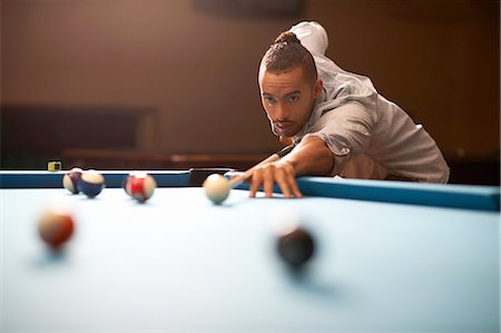 Man playing pool Stock Photo - Premium Royalty-Free, Code: 649-08480190