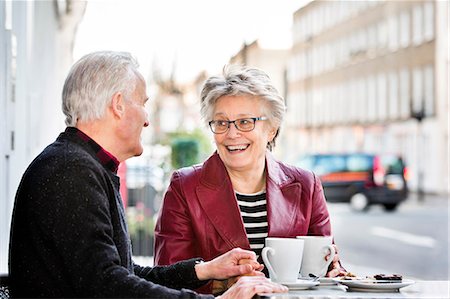 simsearch:6102-08184209,k - Romantic senior couple at sidewalk cafe holding hands Stock Photo - Premium Royalty-Free, Code: 649-08549119