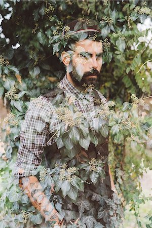 double exposure image - Man superimposed onto bush Stock Photo - Premium Royalty-Free, Code: 649-08543199