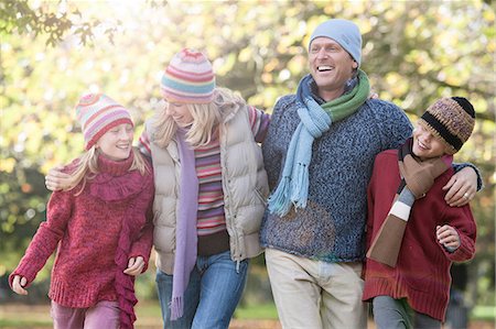 simsearch:400-05676627,k - Family walking together in park Stock Photo - Premium Royalty-Free, Code: 649-08543431