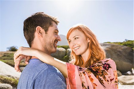simsearch:649-08543922,k - Couple hugging outdoors, face to face, smiling Stockbilder - Premium RF Lizenzfrei, Bildnummer: 649-08543916