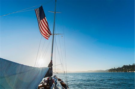 patriotic not military not sport not man not woman not child not animal not england not canada - Yacht and American flag, Sausalito, California, USA Stock Photo - Premium Royalty-Free, Code: 649-08565545