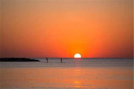 paddleboarder - Paddleboarders at sunset, Tel Aviv, Israel Stock Photo - Premium Royalty-Free, Code: 649-08565727