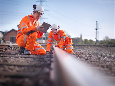 railway - Railway maintenance workers using digital tablet to inspect track Stock Photo - Premium Royalty-Free, Code: 649-08565788