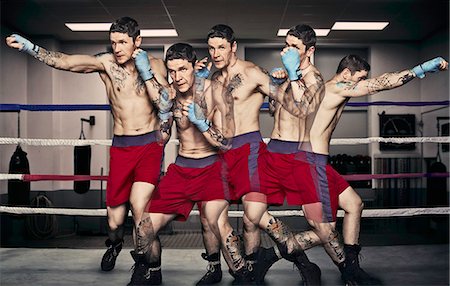 simsearch:858-05799228,k - Multiple exposure of boxer punching Foto de stock - Sin royalties Premium, Código: 649-08560641