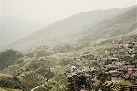 Terraced fields and hillside village Stock Photo - Premium Royalty-Free, Code: 649-08560949