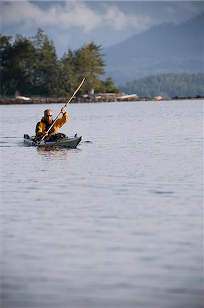 Kayaker in still lake Stock Photo - Premium Royalty-Free, Code: 649-08561176