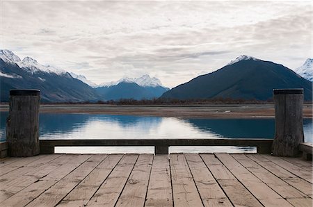 Wooden dock on still rural lake Stock Photo - Premium Royalty-Free, Code: 649-08561590