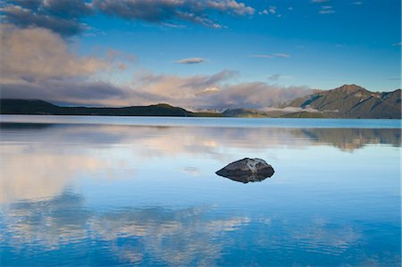 simsearch:649-08560872,k - Rural mountains reflected in still lake Photographie de stock - Premium Libres de Droits, Code: 649-08561691