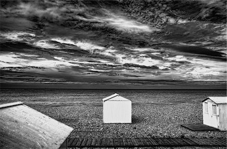 european beach huts - Huts on rocky beach Stock Photo - Premium Royalty-Free, Code: 649-08561791