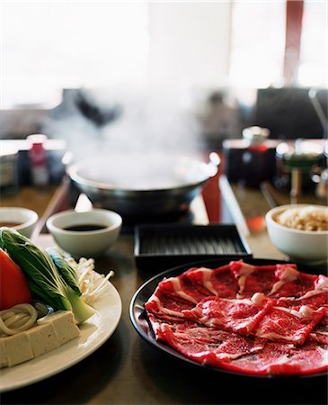 Food ready to cook in hot wok Foto de stock - Sin royalties Premium, Código: 649-08561835