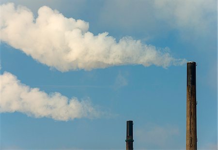 simsearch:649-08561987,k - Smoke billowing from industrial chimneys Stock Photo - Premium Royalty-Free, Code: 649-08561987