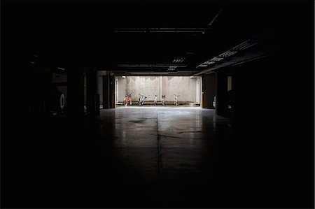 dark tunnel - Bicycles in garage, Costa Rica Stock Photo - Premium Royalty-Free, Code: 649-08562313