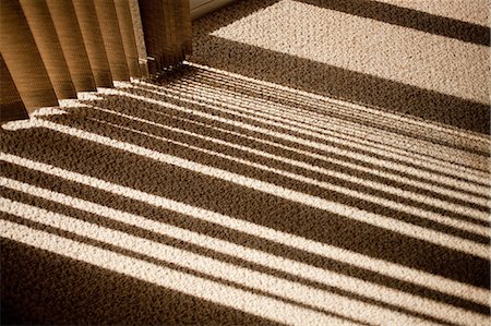 simsearch:649-08562431,k - Window blinds casting shadow on carpet Stock Photo - Premium Royalty-Free, Code: 649-08562425