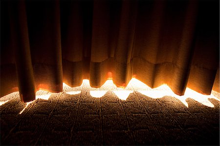 sunlight abstract - Sunlight coming under curtains Stock Photo - Premium Royalty-Free, Code: 649-08562820
