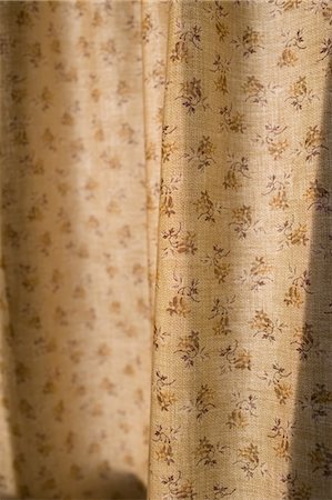 floral designs on fabrics - Patterned curtain Stock Photo - Premium Royalty-Free, Code: 649-08562892