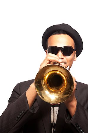 Man playing trumpet Stock Photo - Premium Royalty-Free, Code: 649-08563193