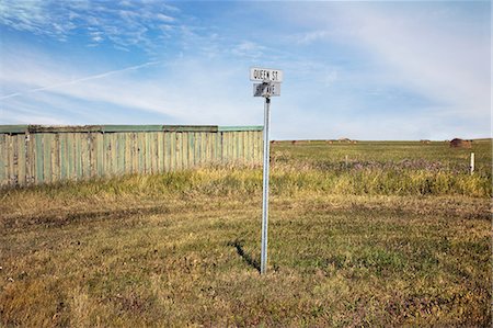 road sign, canada - Street sign in a field Stock Photo - Premium Royalty-Free, Code: 649-08563848