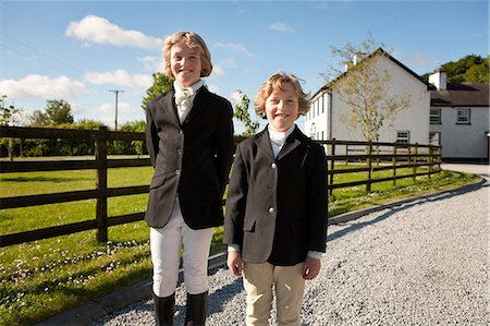 Portrait of boys wearing horse riding clothes Stock Photo - Premium Royalty-Free, Code: 649-08563970