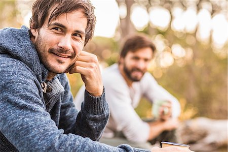 simsearch:649-08576582,k - Two men sitting in forest drinking coffee, Deer Park, Cape Town, South Africa Stock Photo - Premium Royalty-Free, Code: 649-08576270