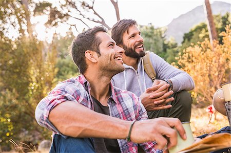 Men having coffee together in forest, Deer Park, Cape Town, South Africa Stock Photo - Premium Royalty-Free, Code: 649-08576559