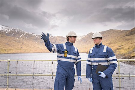 power plant - Workers on dam with water at hydroelectric power station Stock Photo - Premium Royalty-Free, Code: 649-08577062