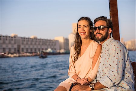 simsearch:649-08577651,k - Romantic couple on boat at Dubai marina, United Arab Emirates Stock Photo - Premium Royalty-Free, Code: 649-08577644