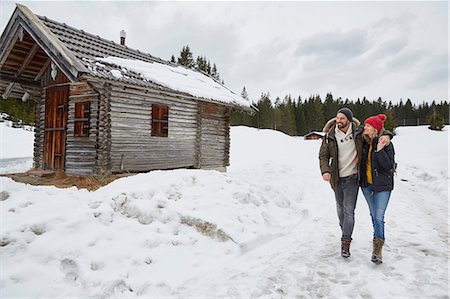 people and winter - Couple hiking from log cabin in winter, Elmau, Bavaria, Germany Stock Photo - Premium Royalty-Free, Code: 649-08577721