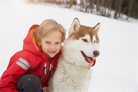 elmau - Portrait of boy and husky in snow, Elmau, Bavaria, Germany Foto de stock - Royalty Free Premium, Número: 649-08577742