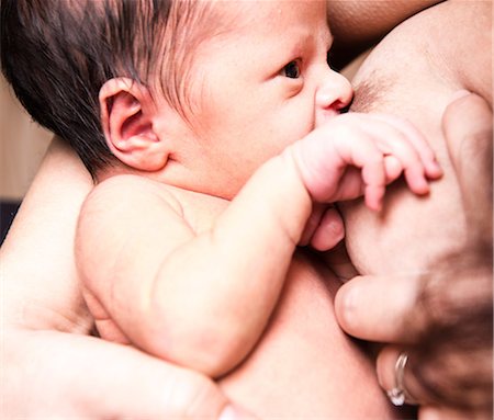 Close up of baby boy breastfeeding from mid adult mother Foto de stock - Sin royalties Premium, Código: 649-08577798