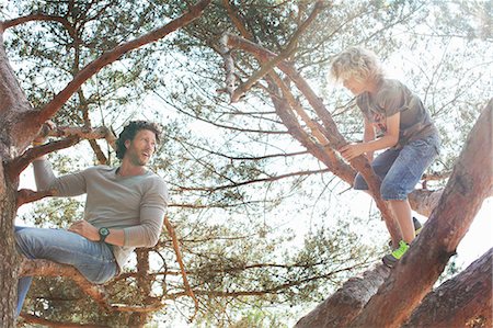 simsearch:695-03385136,k - Father and son climbing tree Stock Photo - Premium Royalty-Free, Code: 649-08578078
