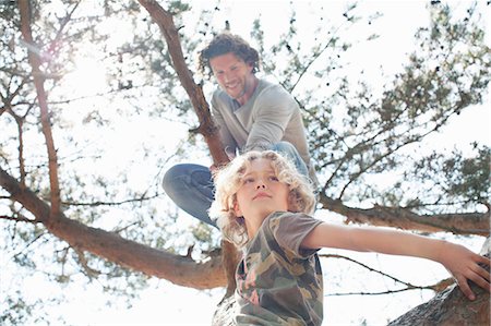 simsearch:695-03385136,k - Father and son climbing tree Stock Photo - Premium Royalty-Free, Code: 649-08578080