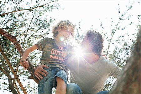 simsearch:695-03385136,k - Father and son climbing tree Stock Photo - Premium Royalty-Free, Code: 649-08578081