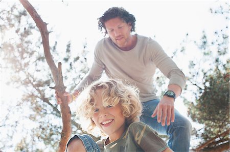 simsearch:695-03385136,k - Father and son climbing tree Stock Photo - Premium Royalty-Free, Code: 649-08578082