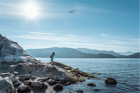 Woman on rocks, Whytecliff Park, British Columbia,Canada Stock Photo - Premium Royalty-Free, Code: 649-08632949