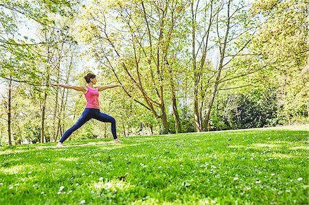 simsearch:649-09246338,k - Woman, arms open, legs apart in yoga position Stock Photo - Premium Royalty-Free, Code: 649-08660705